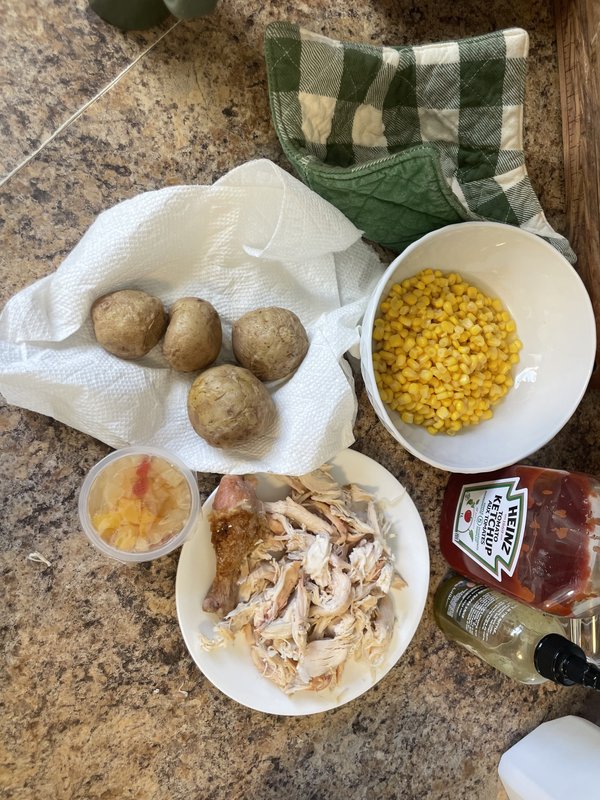 Low fat meal prep — chicken breast, potatoes, corn, ketchup and hot sauce for cutting diet